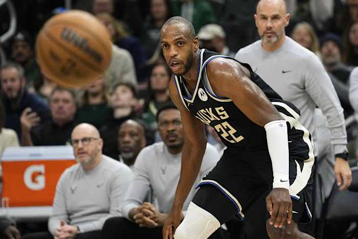 Milwaukee Bucks forward Khris Middleton (22) looks at the ball during the second quarter against the Cleveland Cavaliers at Fiserv Forum.